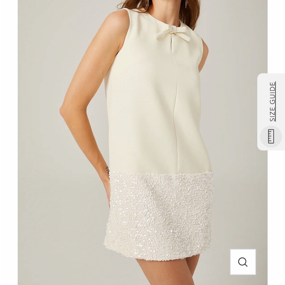 Elegant Cream Sleeveless Dress with Sequin Hem